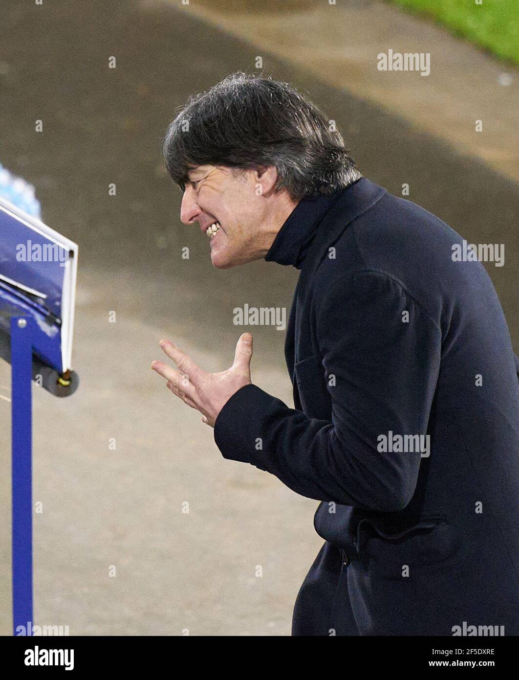 DFB headcoach Joachim Jogi LOEW, LÖW,wutanfall, Emotions, feelings, reaction, anger, furious, scream, rage, action, aggressive, aggression,  in the match GERMANY - ICELAND  Deutschland - ISLAND Qualification for World Championships, WM Quali, Season 2020/2021,  March 25, 2021  in Duisburg, Germany.  © Peter Schatz / Alamy Live News  Important: DFB regulations prohibit any use of photographs as image sequences and/or quasi-video. Stock Photo