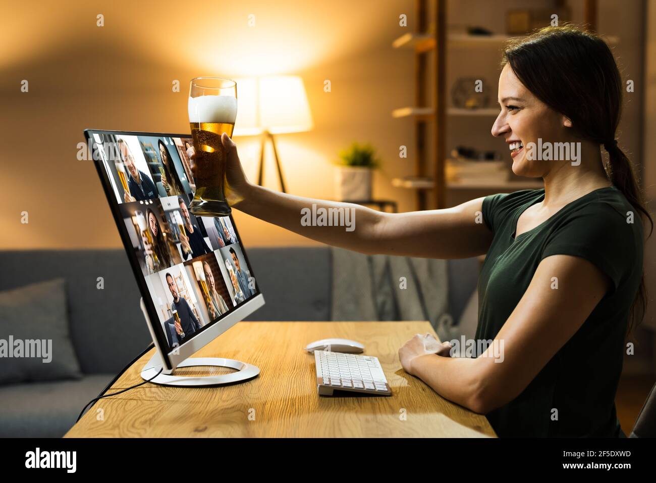 Virtual Beer Drink Online Party Using Computer Stock Photo - Alamy