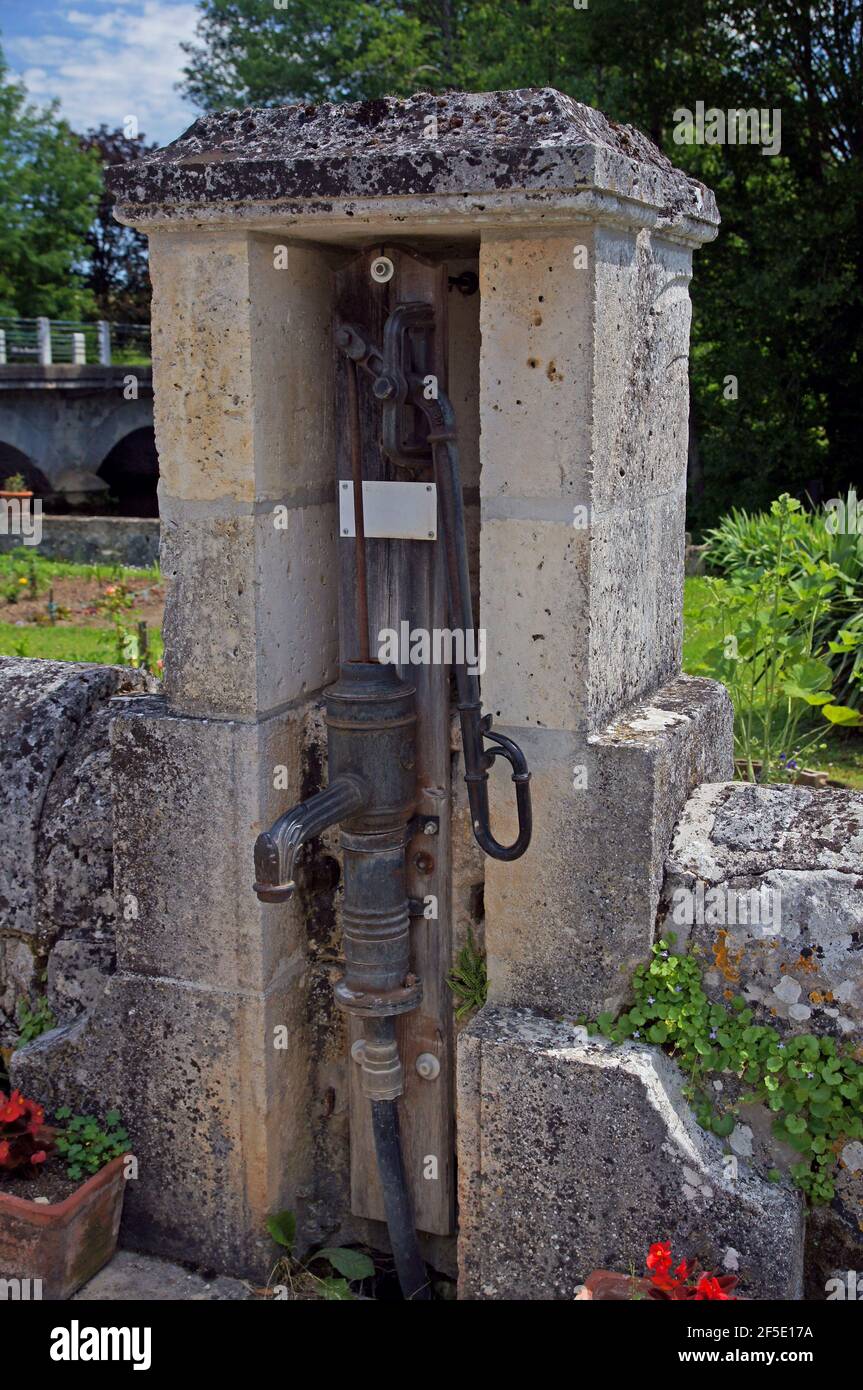 An ancient French village water pump Stock Photo