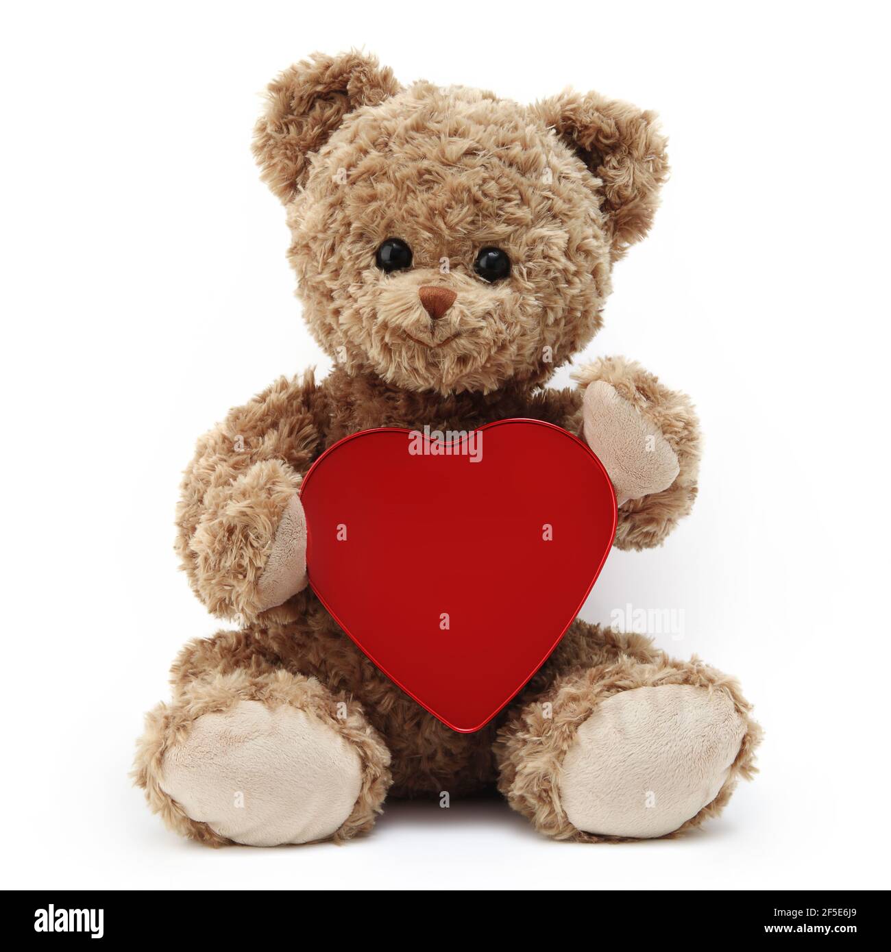 teddy bear with red heart isolated on white background Stock Photo - Alamy
