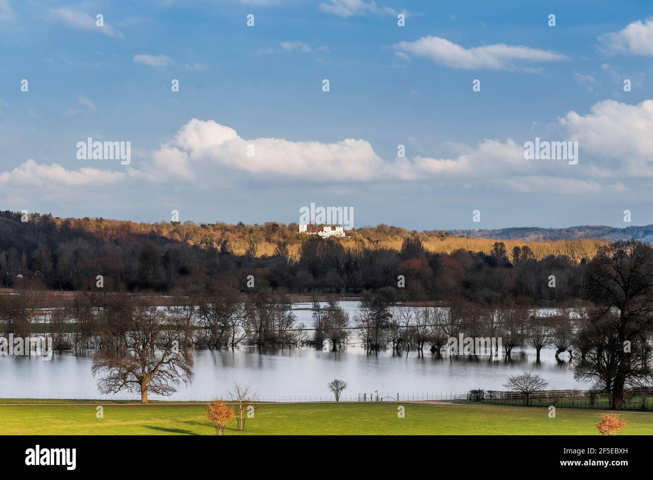 The flooded River Thames at Culham, with Medmenham and Danesfield House Hotel beyond; Aston, Remenham, Berkshire, UK Stock Photo