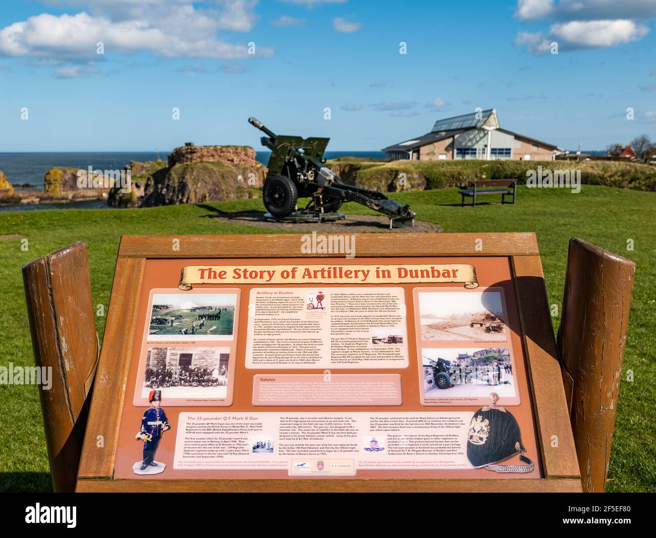 Military history information board by 25-pounder British field artillery gun, Dunbar, East Lothian, Scotland, UK Stock Photo