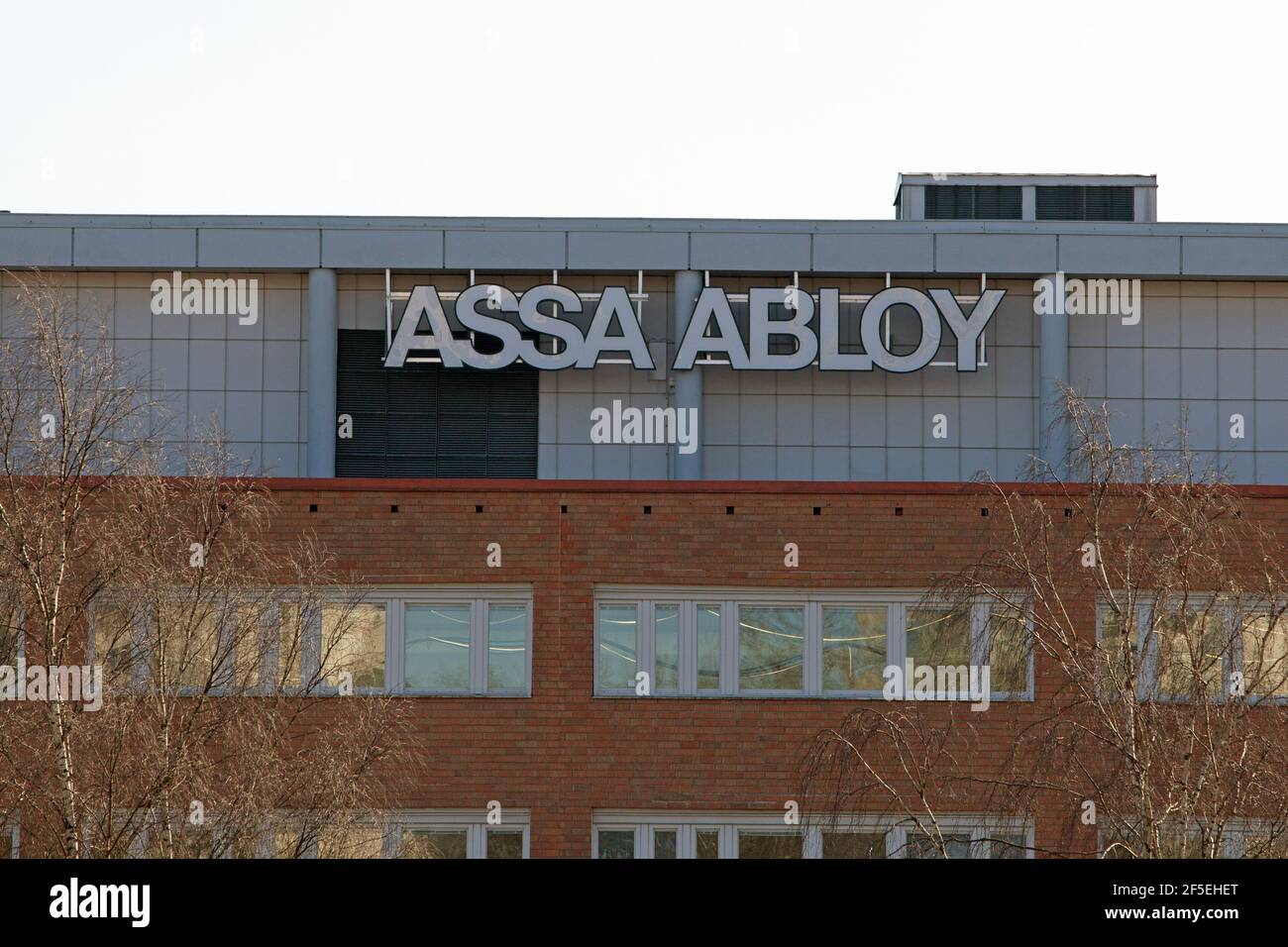 Stockholm, Sweden - March 25, 2021: Fasade sign of Swedish Finnish lock company Assa-Abloy to be used for news about the company, their financial deve Stock Photo
