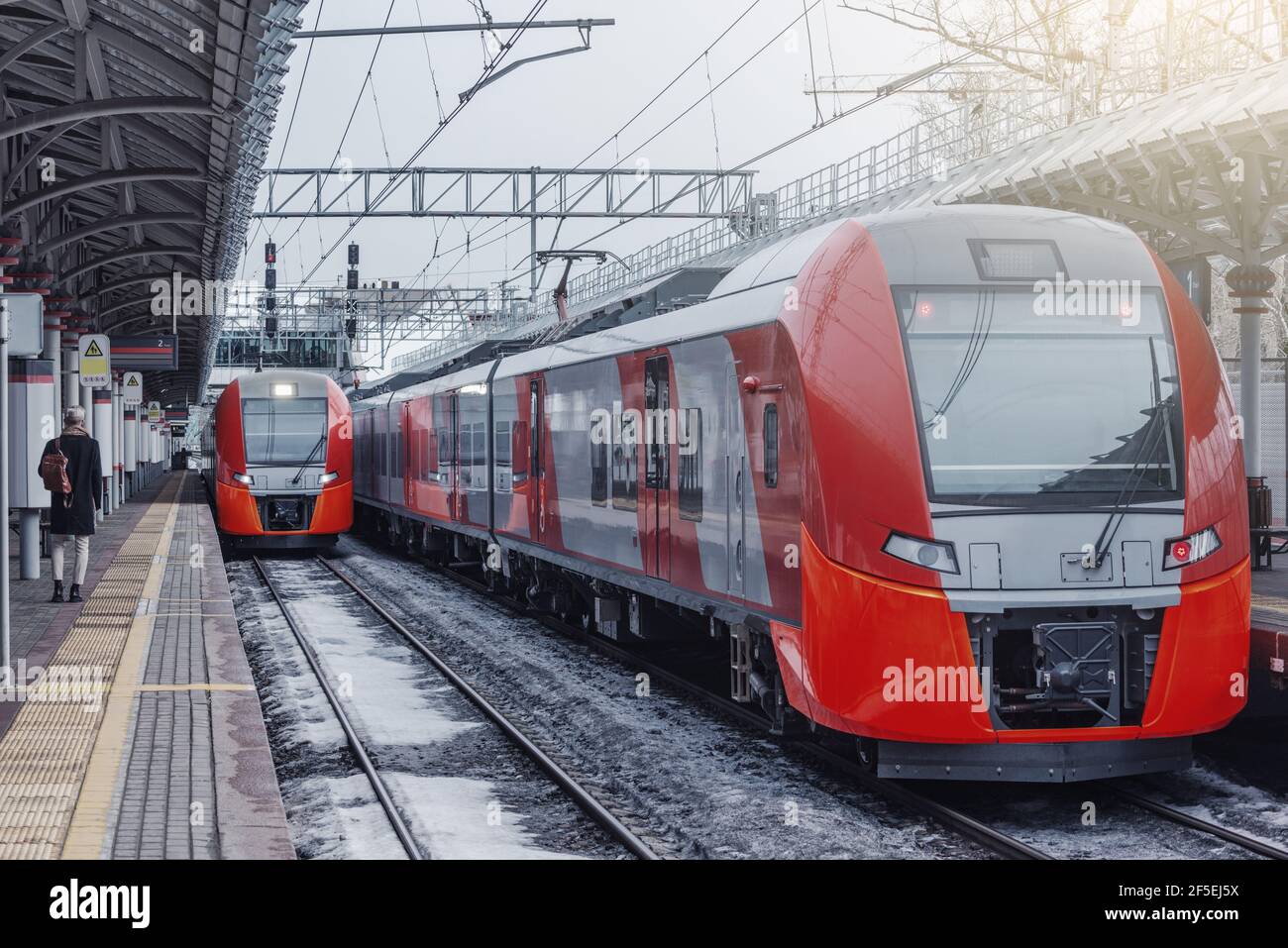 Highspeed trains by the station platform at winter day. Moscow. Russia. Stock Photo