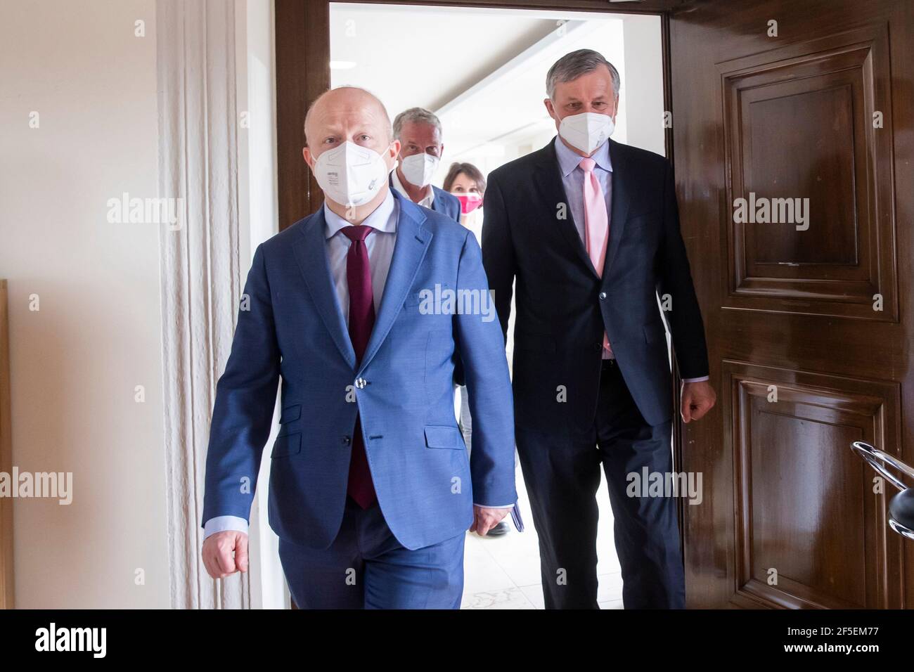 Stuttgart, Germany. 26th Mar, 2021. Michael Theurer (l), deputy leader of  the FDP parliamentary group, and Hans-Ulrich Rülke (r), FDP parliamentary  group leader in the state parliament of Baden-Württemberg, arrive for  exploratory