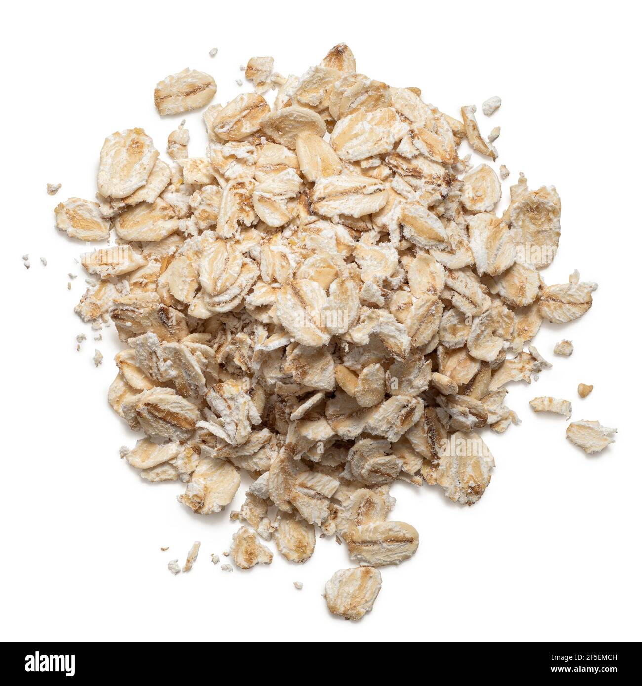Pile of uncooked porridge oats isolated on white. Top view. Stock Photo