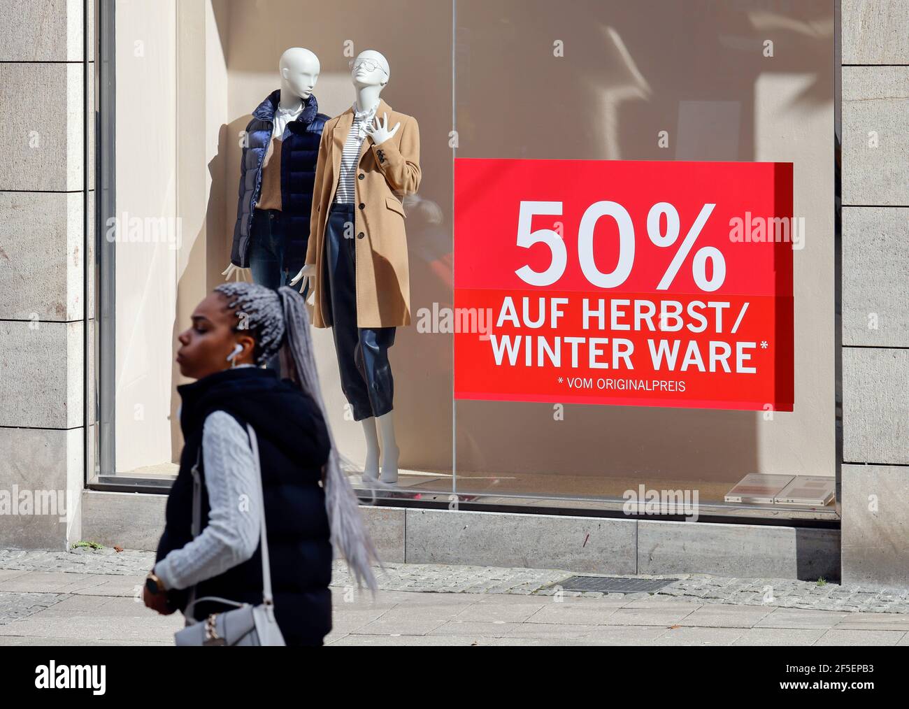 Female mannequins standing in store window display of women casual clothing  shop in shopping mall Stock Photo - Alamy