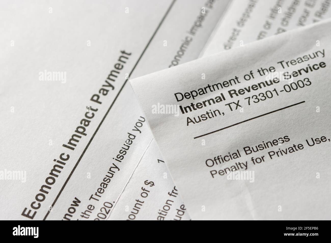 Closeup of the Economic Impact Payment (EIP) letter from the Internal Revenue Service (IRS) received by a taxpayer, seen on March 25, 2021. Stock Photo
