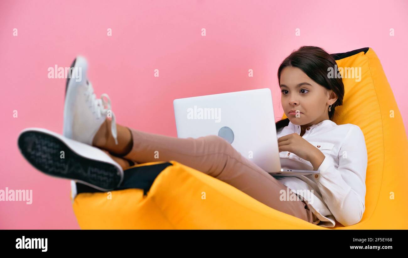 Girl lying on bean bag hi-res stock photography and images - Alamy