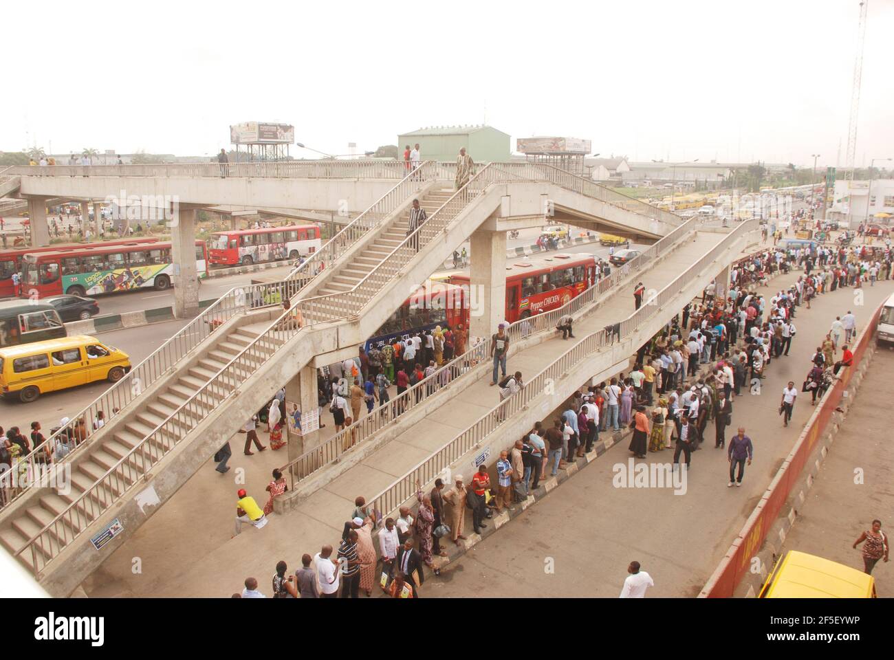 32. Lagos Metro: Commuters waiting for Bus Rapid Transit (BRT) at Oshodi Terminal, Lagos, Nigeria. Stock Photo