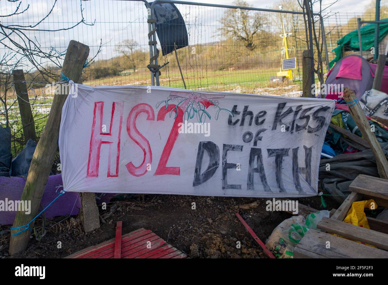 Uxbridge, UK. 19th February, 2021. An HS2 the kiss of death banner at ...