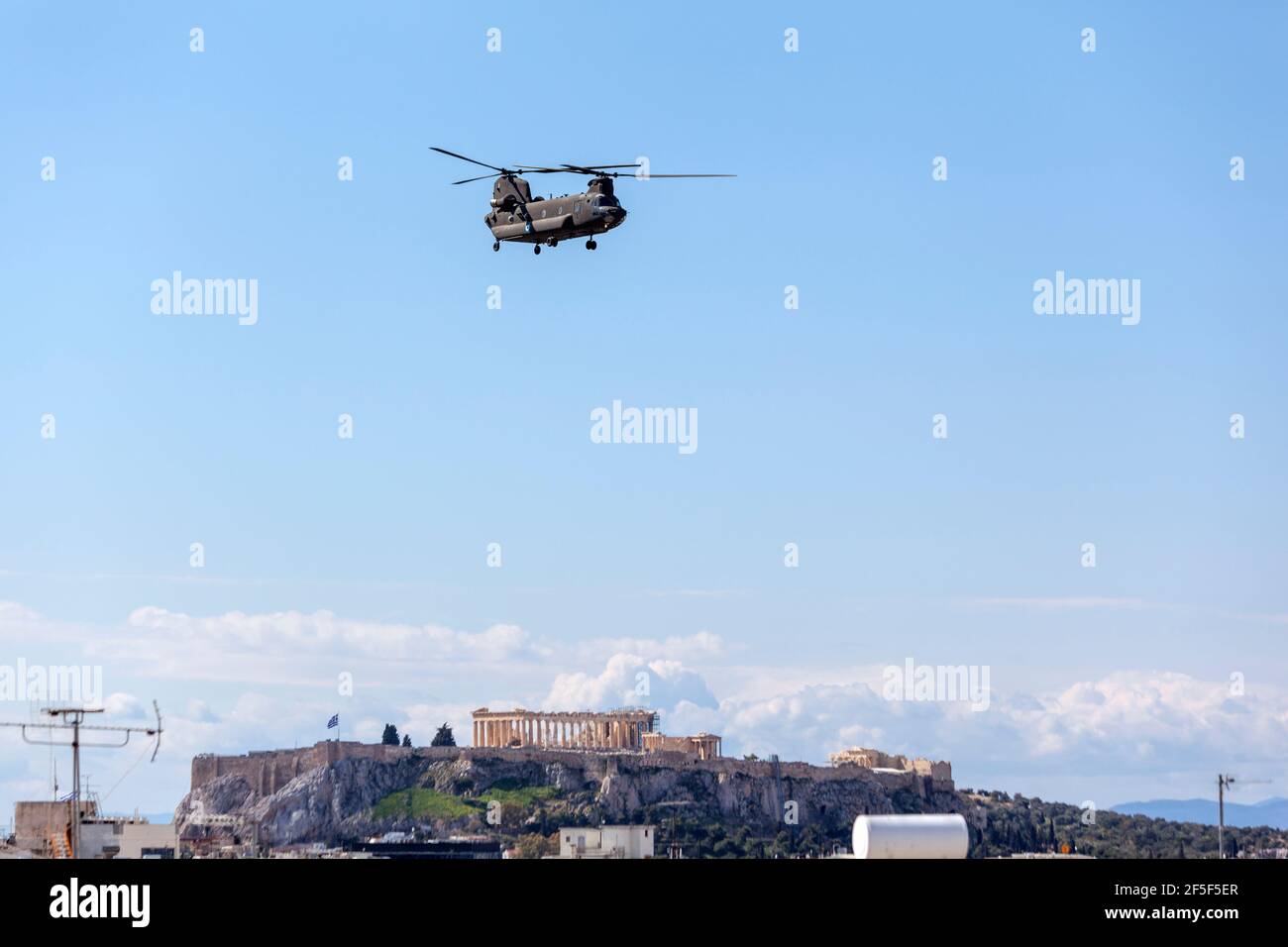 Boeing CH-47 Chinook helicopter flying above Akropolis, Athens, during the parade for the 200 years of the Greek Independence War (March 25 1821-2021) Stock Photo