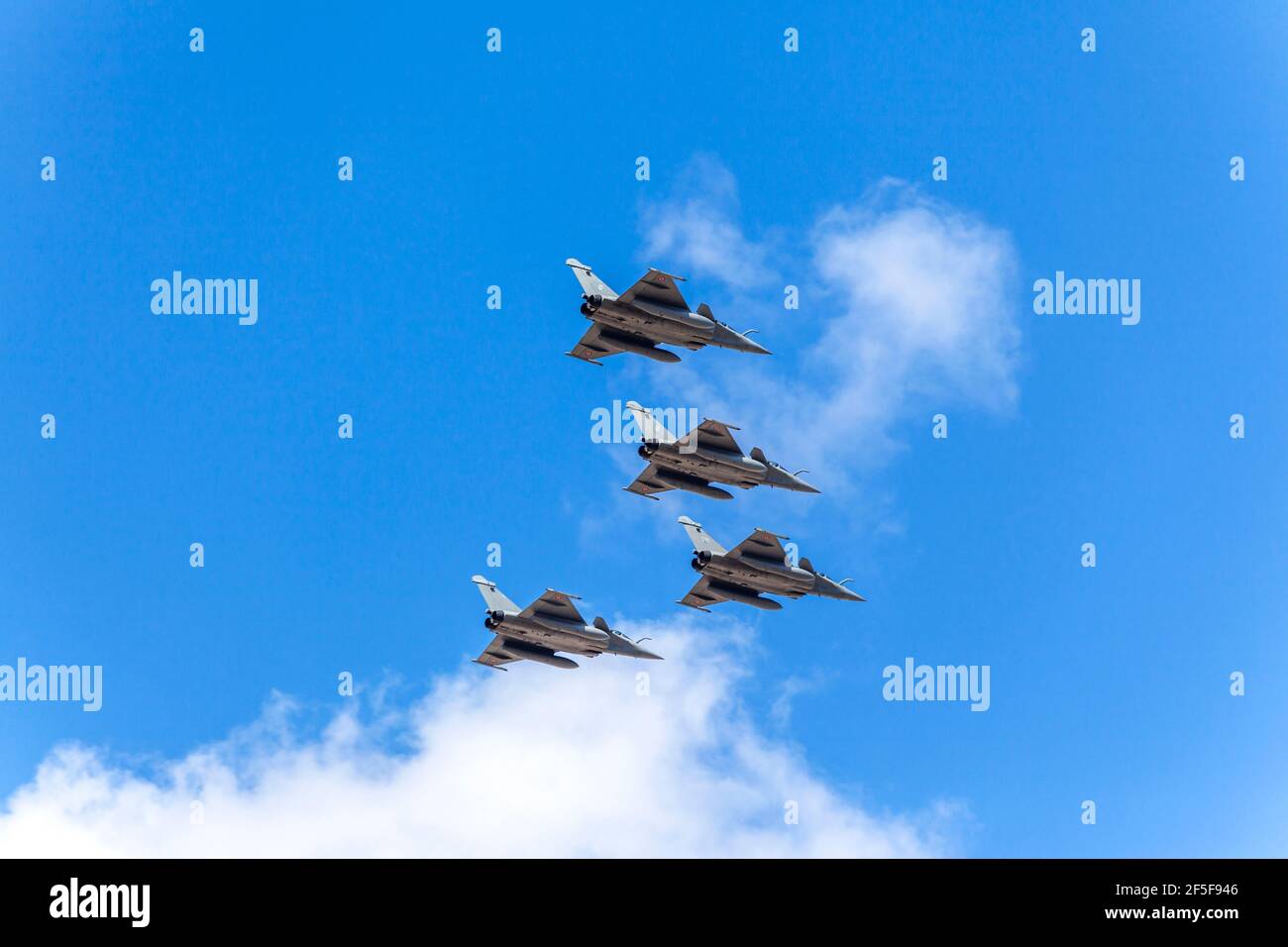 Dassault Rafale fighters of the French Air Force, flying in formation above Athens, during the parade for the 200 years of the Greek Independence War Stock Photo