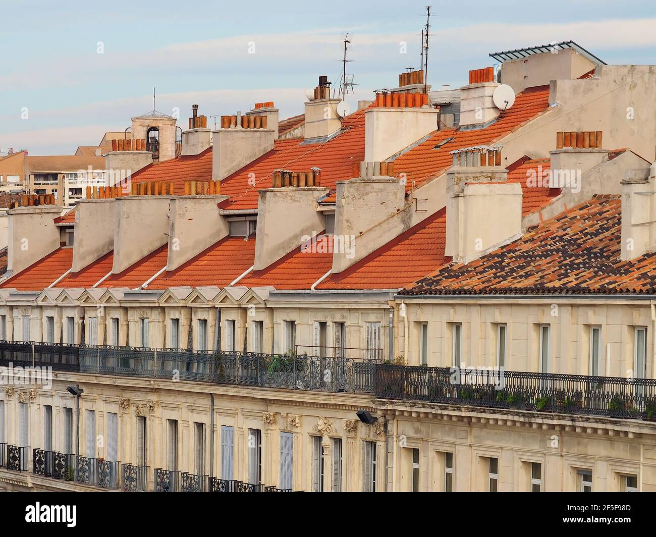 Panoramic view of the rooftops and chimneys of Marseille, France during sunset Stock Photo