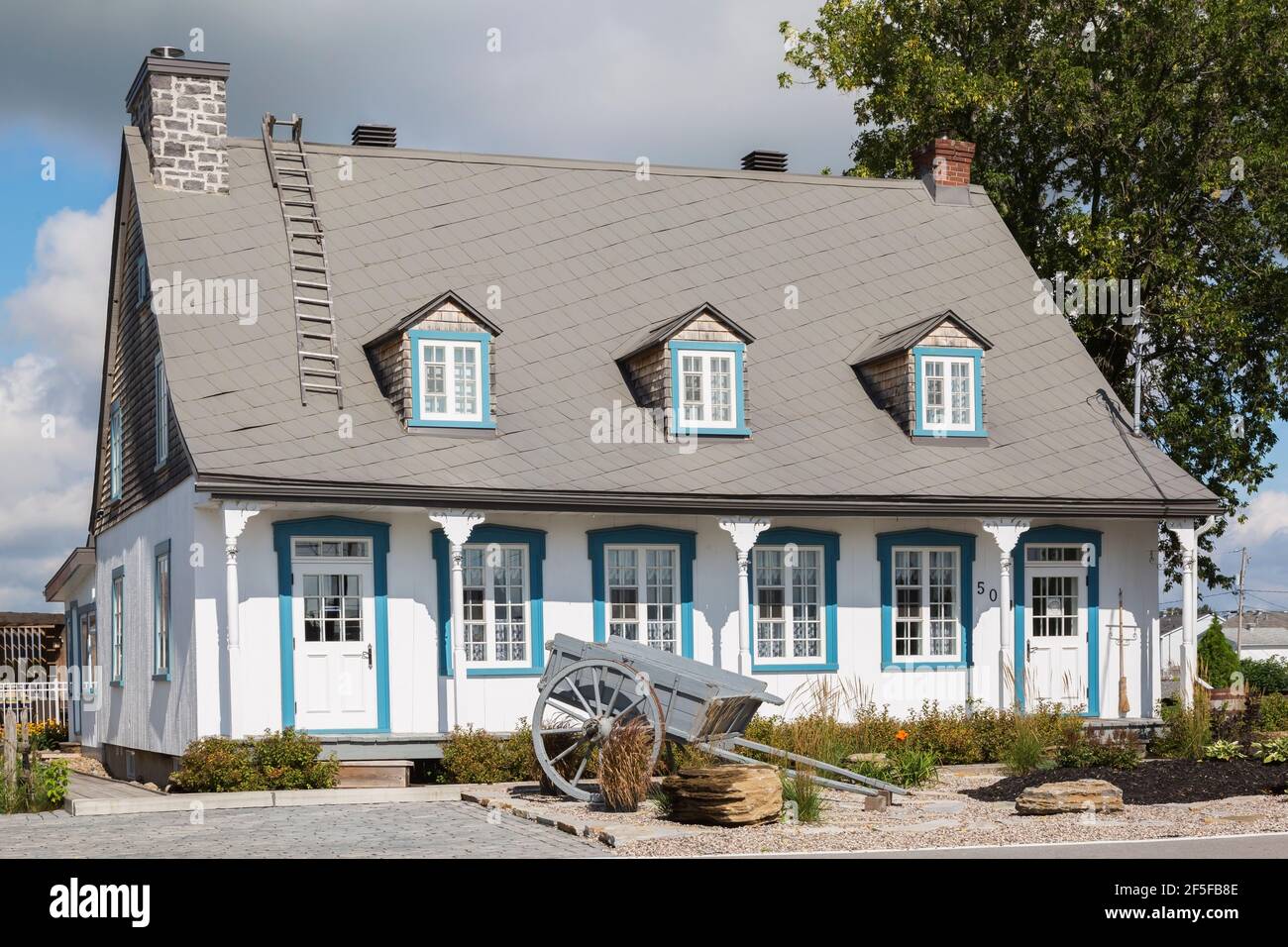 White house with blue trim deals