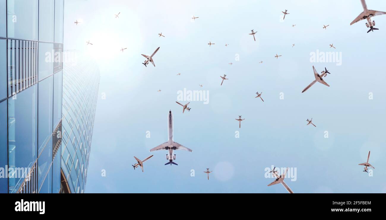 Many passenger planes fly in overcrowded airspace Stock Photo