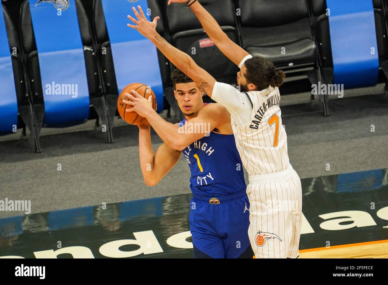 Orlando, Florida, USA, March 23, 2021, Denver Nuggets Michael Porter Jr. #1  seeks a teammate to make a pass at the Amway Center (Photo Credit: Marty  Jean-Louis Stock Photo - Alamy