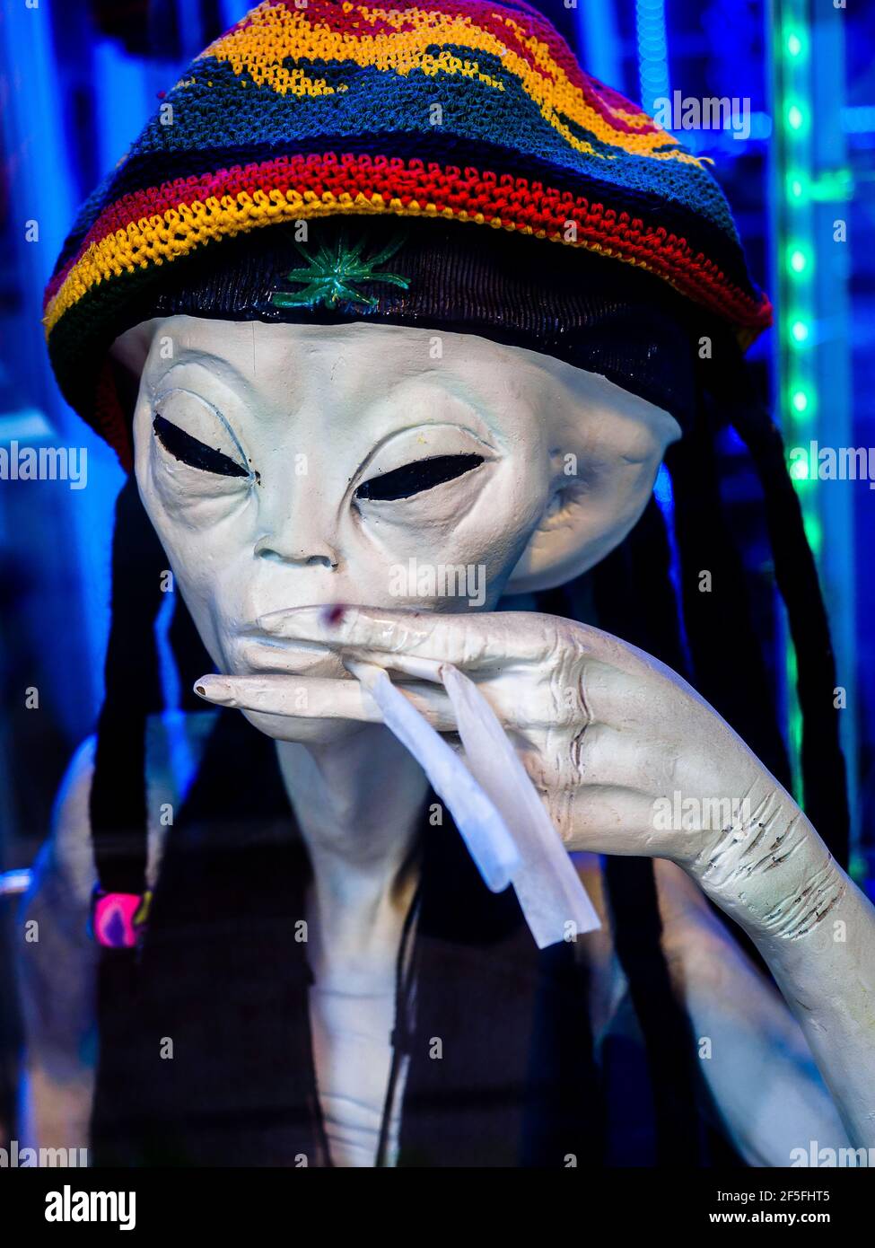 Extraterrestrial Mannequin smoking in front of a shop - Amsterdam, Netherlands Stock Photo