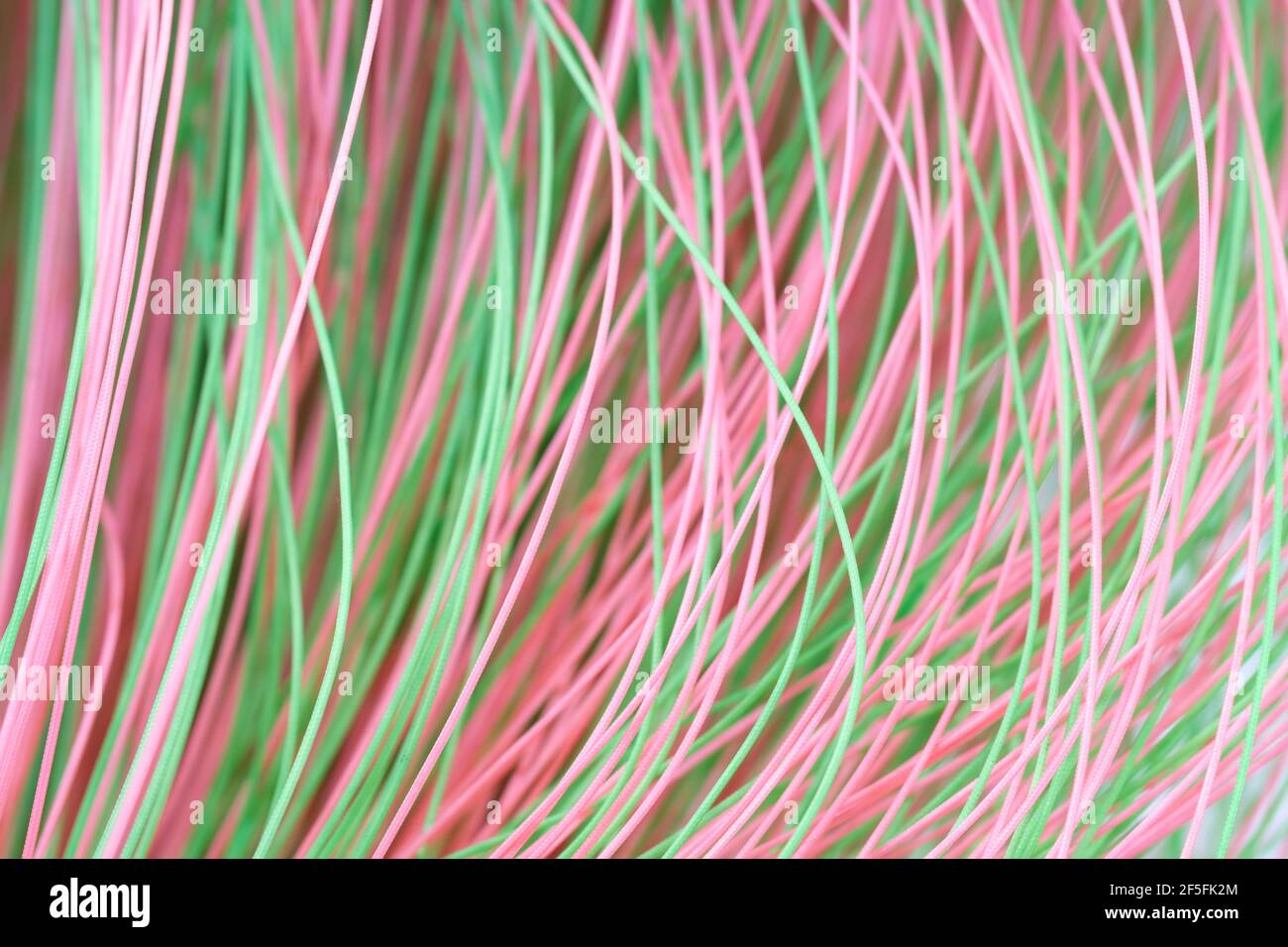 Colored thin wavy threads abstract texture background Stock Photo
