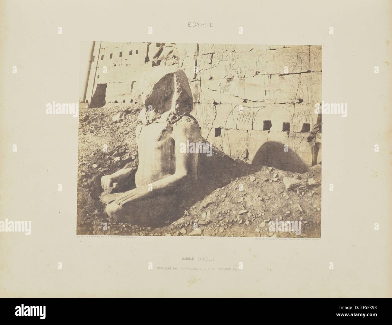 Karnak (Thèbes). Troisième Pylône - Colosse de Spath Calcaire, en D. Félix Teynard (French, 1817 - 1892) Stock Photo
