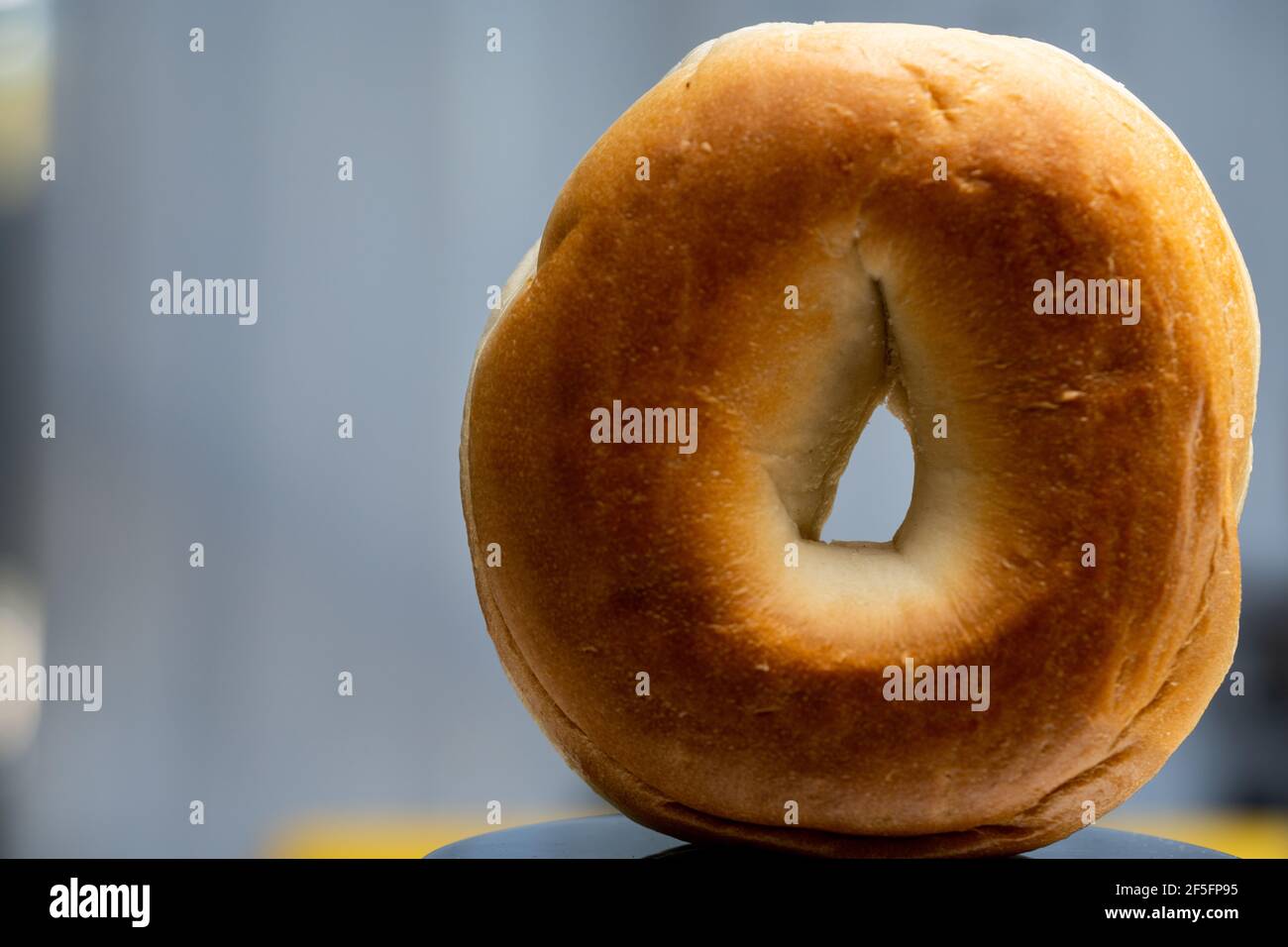 Closeup toasted bagel focus in center of hole Stock Photo