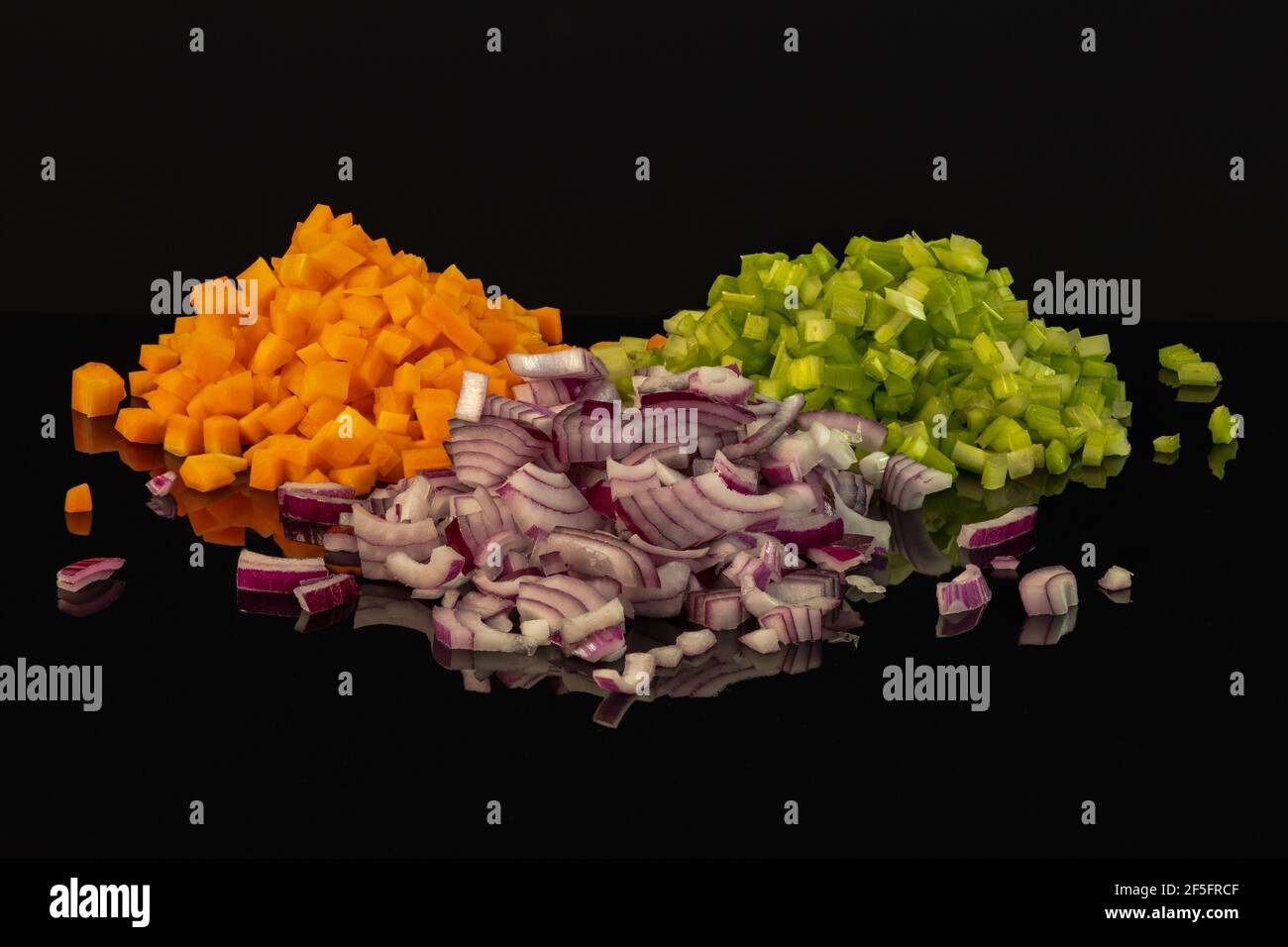 Carrots, celery and onion, the ingredients for an Italian Soffritto ...