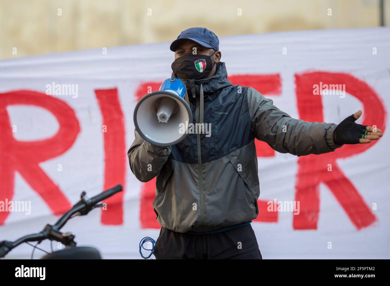 Rome, Italy. 26th Mar, 2021. Strike held in Rome by food delivery riders who call the Internet food delivery platforms to provide contracts, better working condition and better payment. The strike has taking place in about 30 cities across Italy. Credit: LSF Photo/Alamy Live News Stock Photo