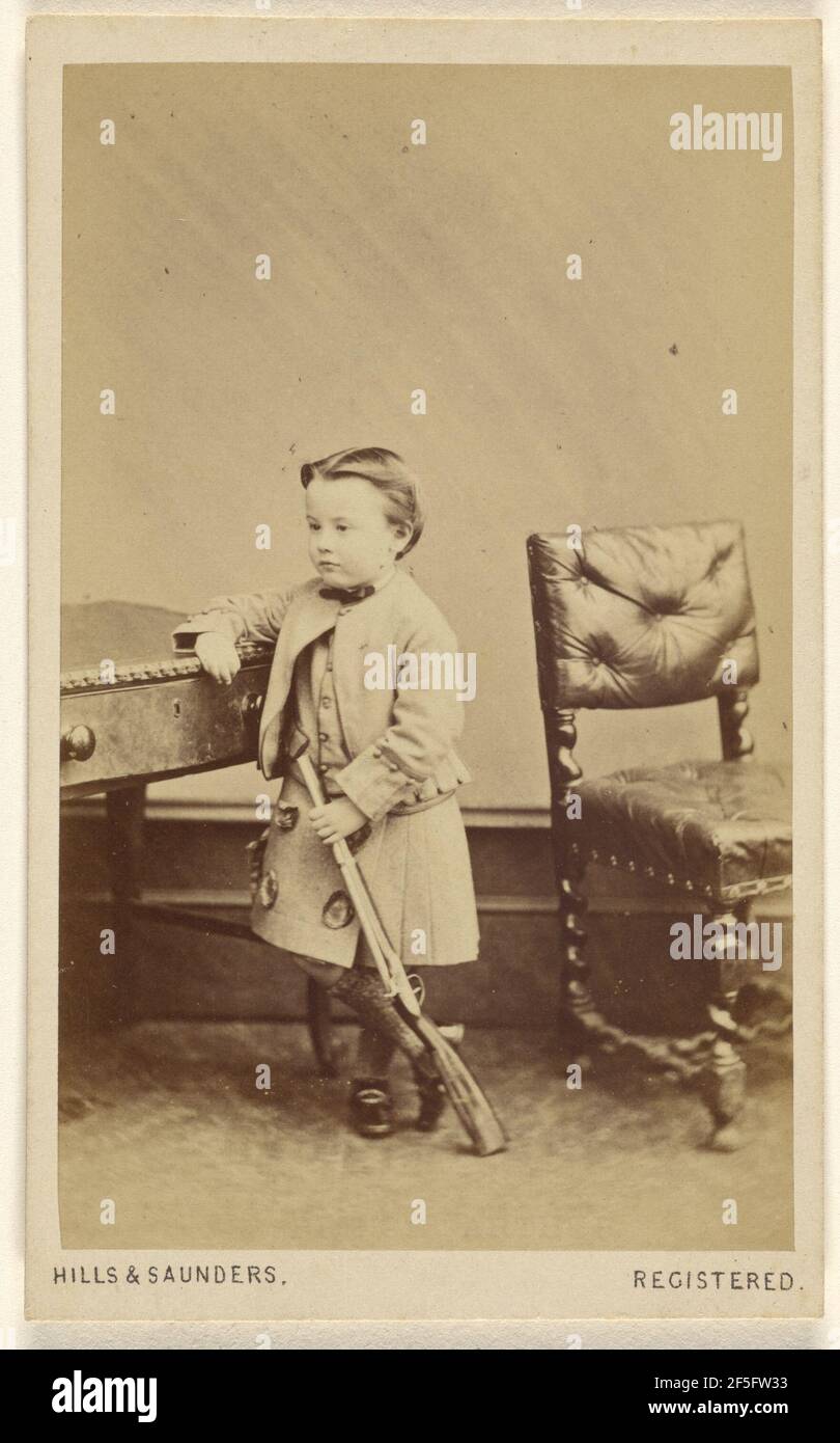 Unidentified little boy standing, holding a toy rifle. Hills & Saunders