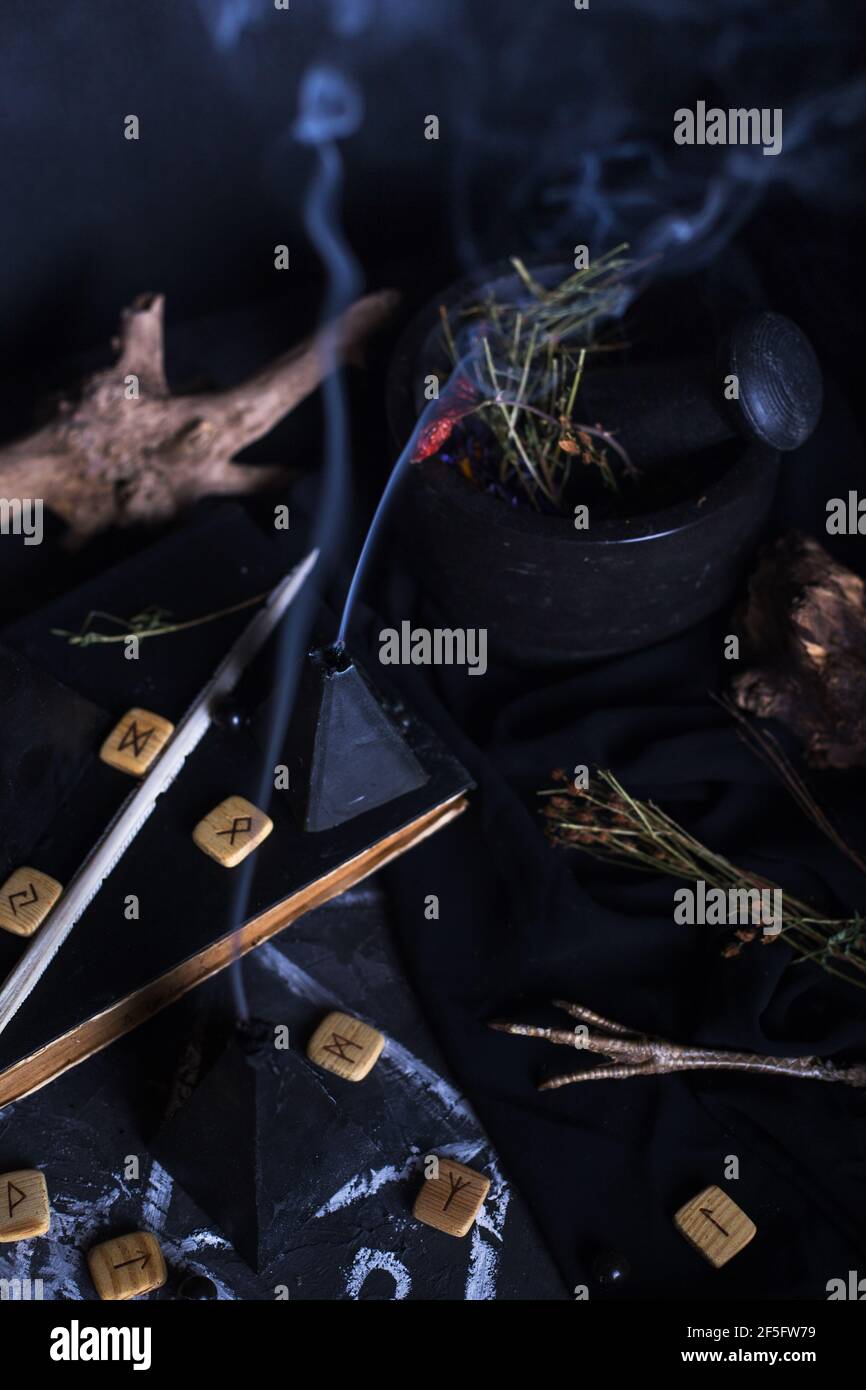 Still life with burning candles and pentagram circle background. Black ...