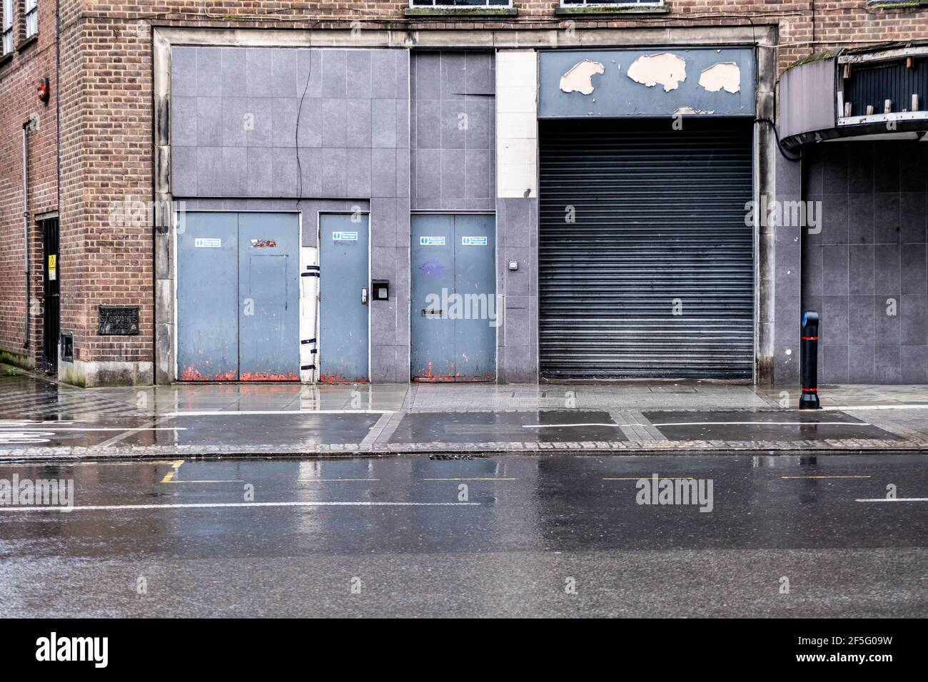 London UK, March 26 2021, Empty Building Business Failure During Covid-19 Coronavirus Lockdown on A Wet Raining Day With No People Stock Photo