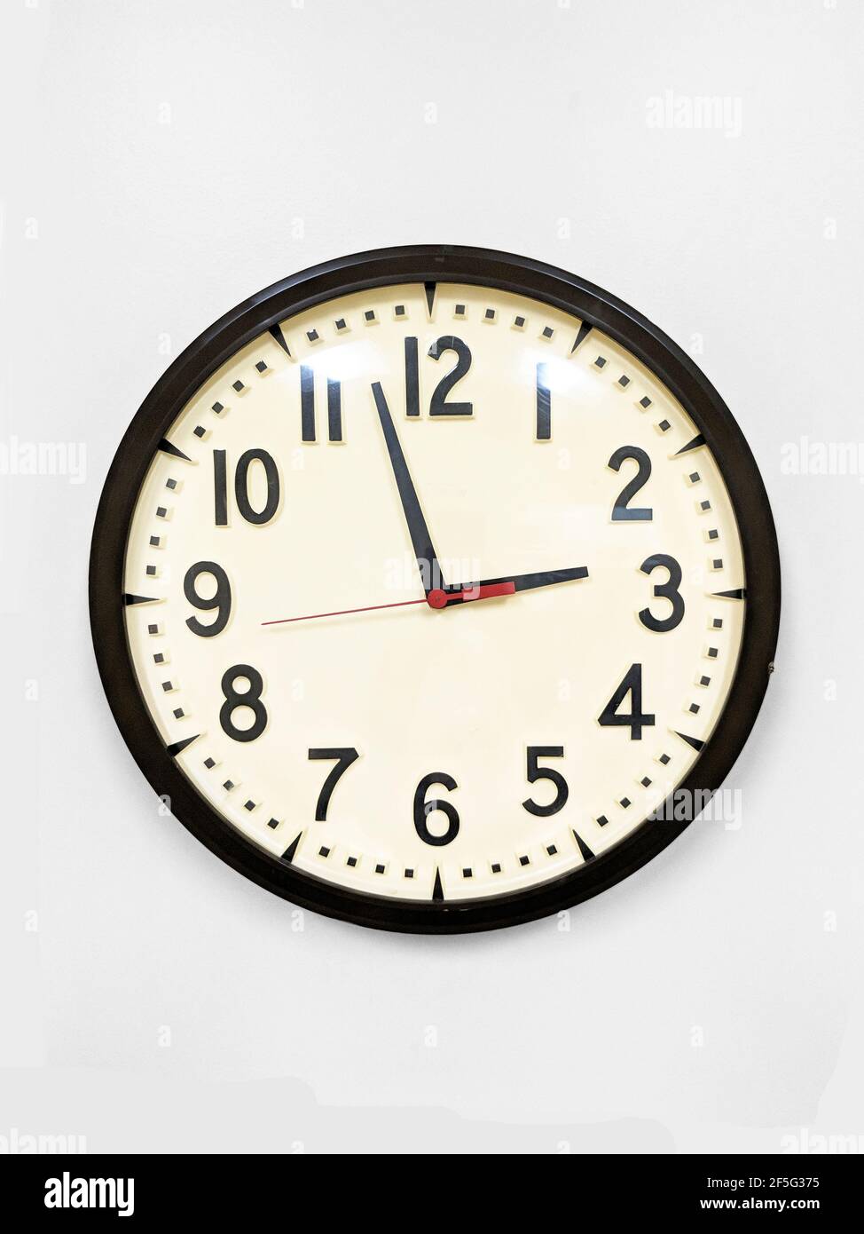 Vintage wall clock isolated on the white background Stock Photo - Alamy