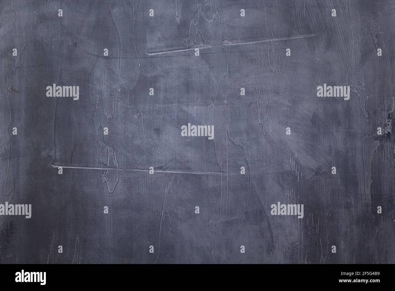 Wall painted background texture as abstract surface. Dirty gray putty background wall texture Stock Photo