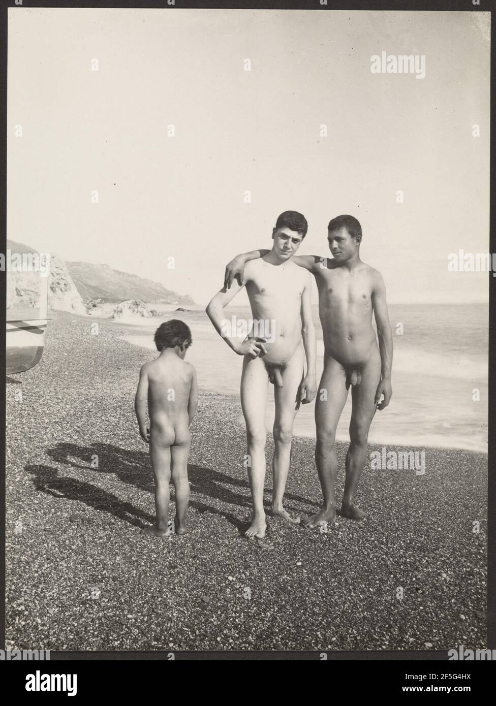 Two Youths and Boy on Beach. Baron Wilhelm von Gloeden (German, 1856 - 1931) Stock Photo