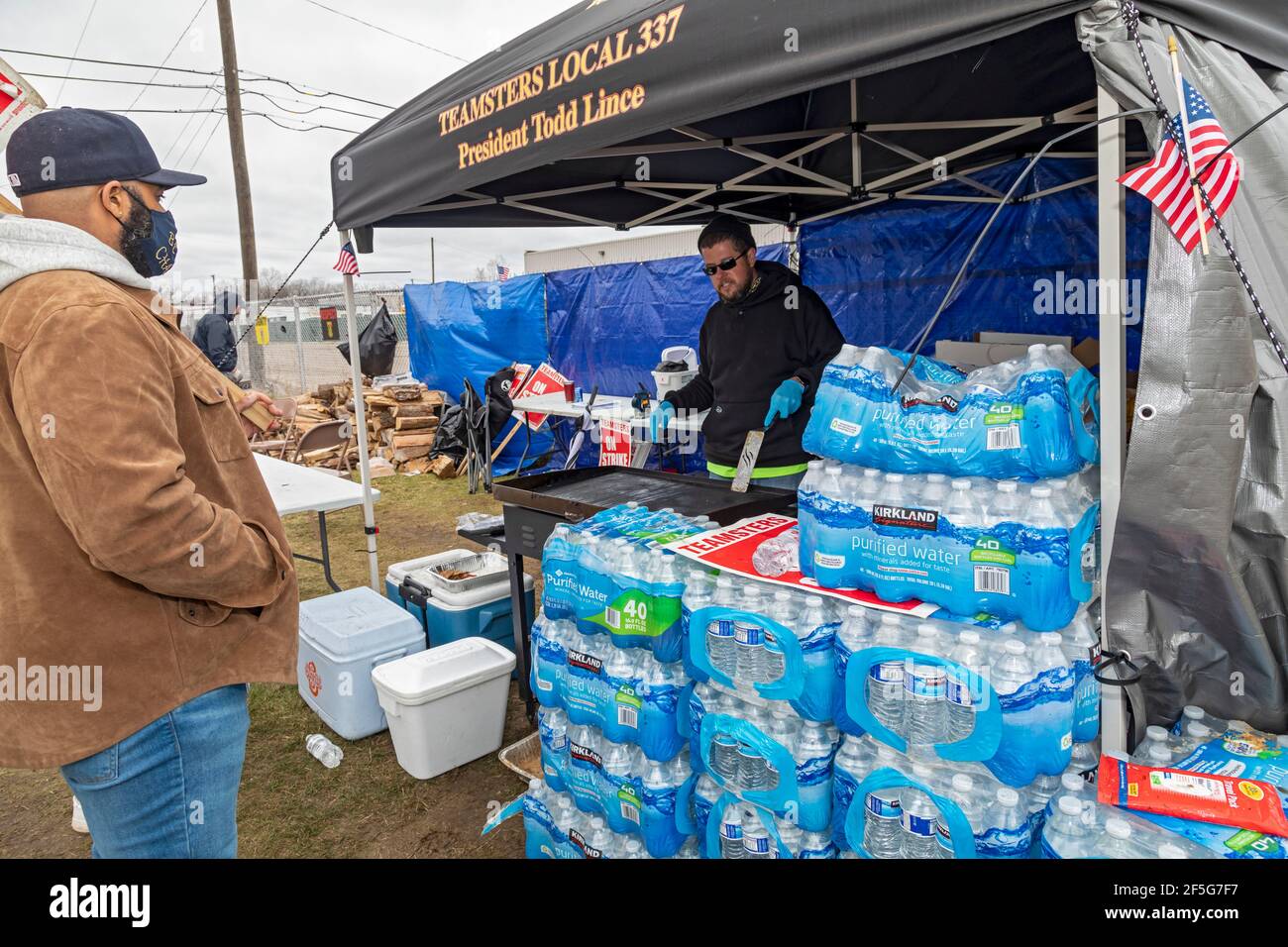 Redford Township, Michigan, USA. 26th Mar, 2021. Workers and supporters