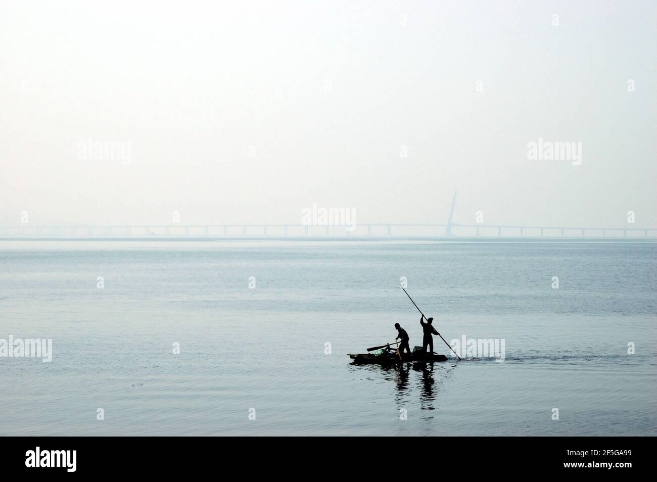 CHINA, SHENZHEN, FEBRUARY 20, 2008: small fishing boat in harbour between Hongkong and Shenzhen, China. Stock Photo