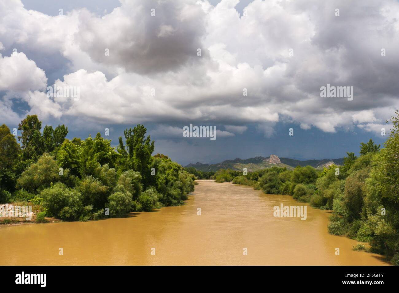 Anatolia Rivers River Eurymedon, modern Köprüçay with Cloudy Sky, near Aspendos, in ...