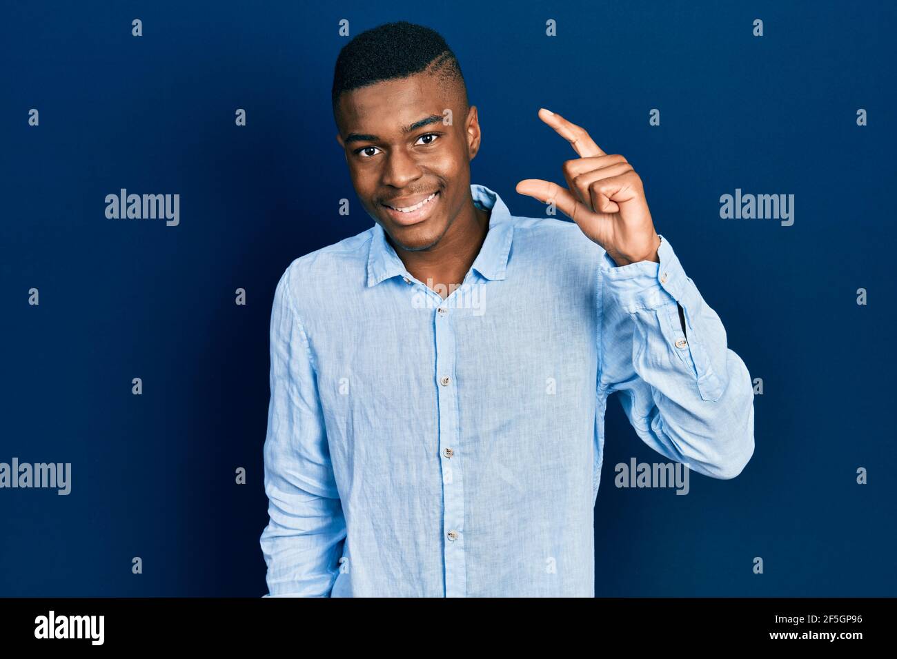 Young african american man wearing casual clothes smiling and confident ...