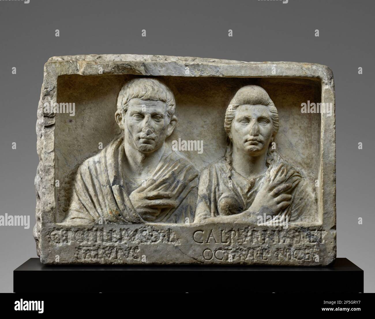 Funerary Relief with Busts of Popillius and Calpurnia. Unknown Stock Photo