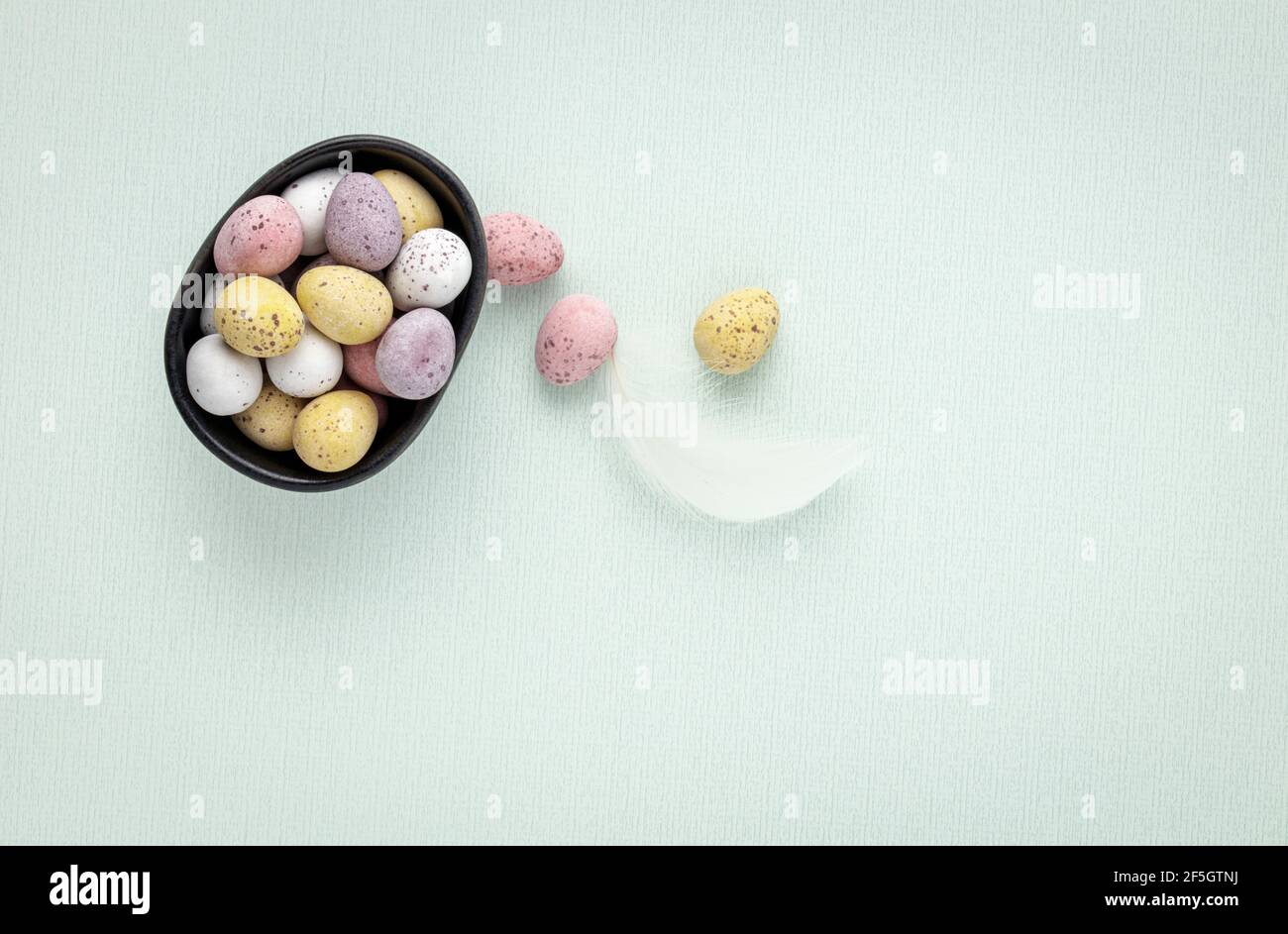 Pastel coloured mini chocolate eggs Stock Photo Alamy