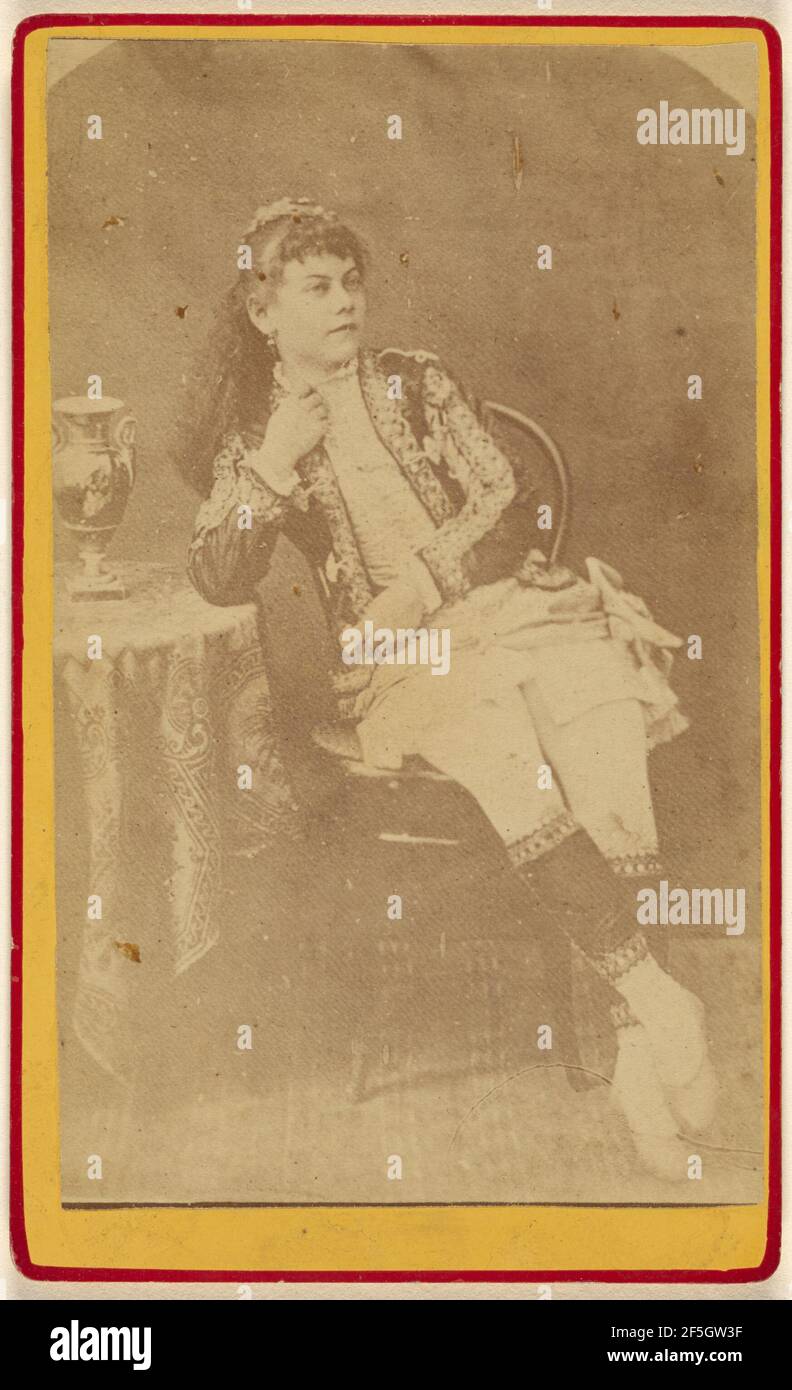 Unidentified young woman seated hi-res stock photography and images - Alamy