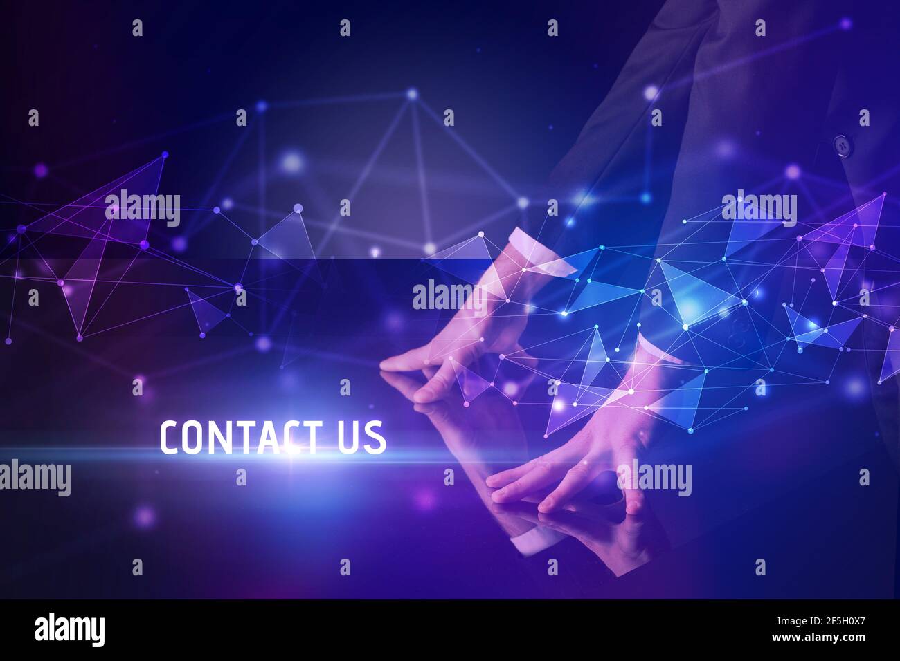 Businessman touching huge screen Stock Photo