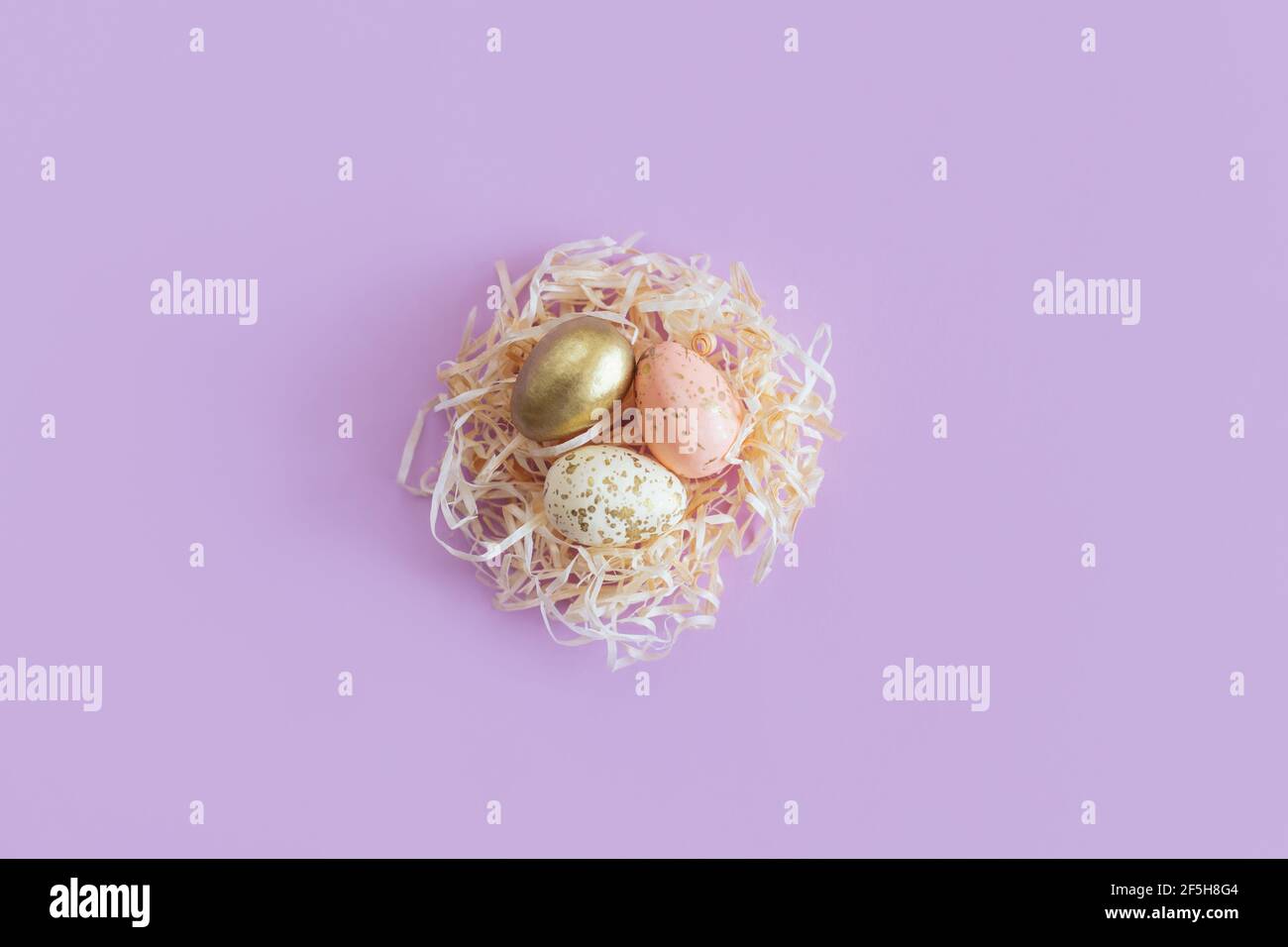 Easter background with eggs in a nest. Pastel colors. Flat lay Stock ...