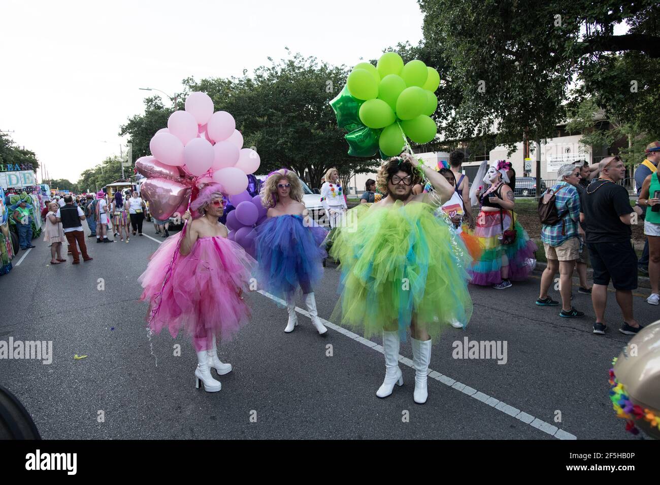 Vibrant costumes and exuberant marchers fill the streets of New Orleans ...