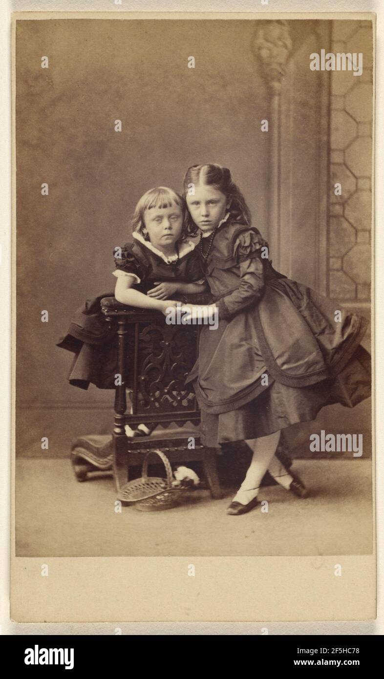 Two unidentified girls, standing. Thomas Rodger (Scottish, 1832 - 1883) Stock Photo