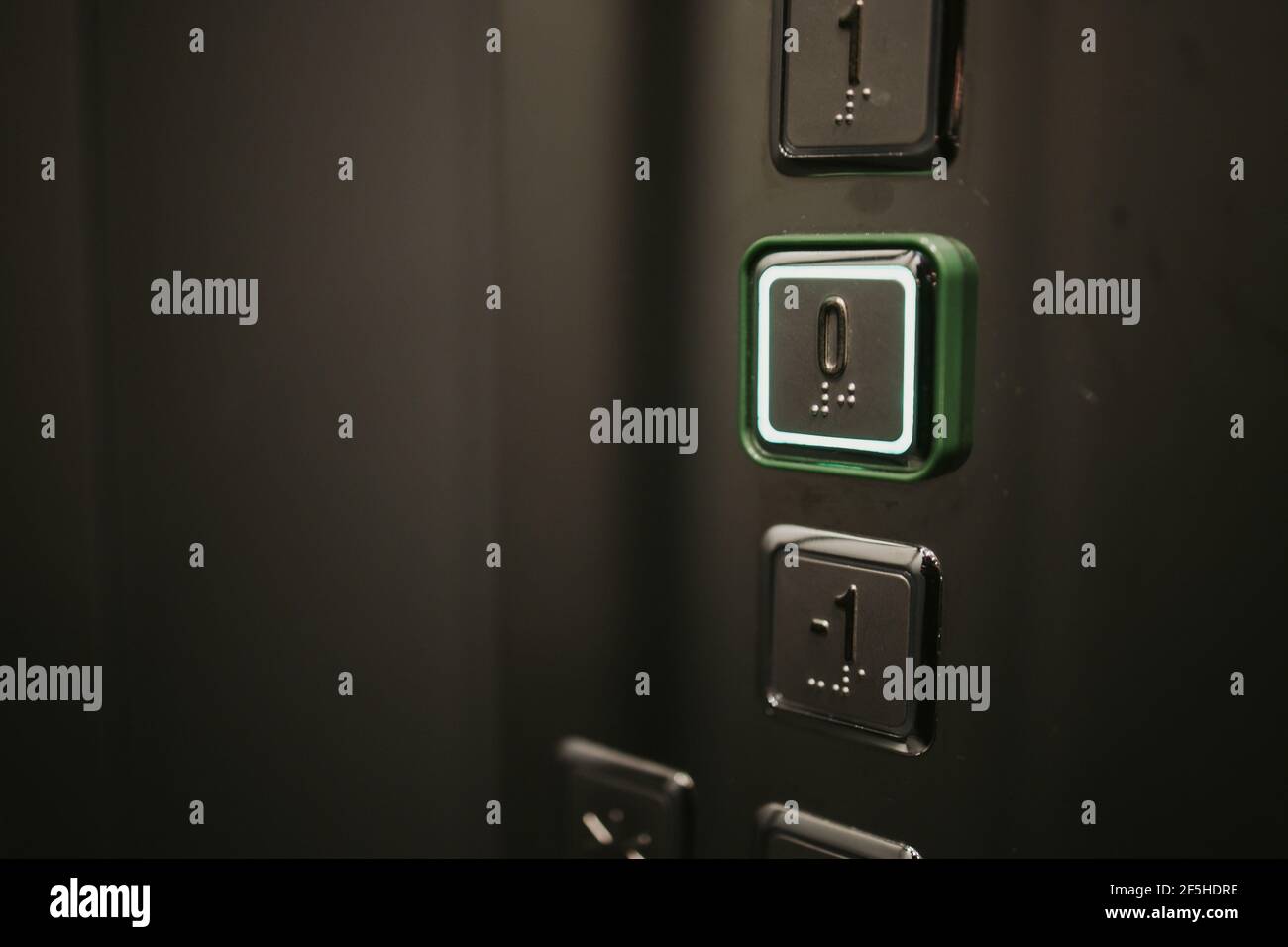 Buttons with floor numbers; background with copy space on the left ...