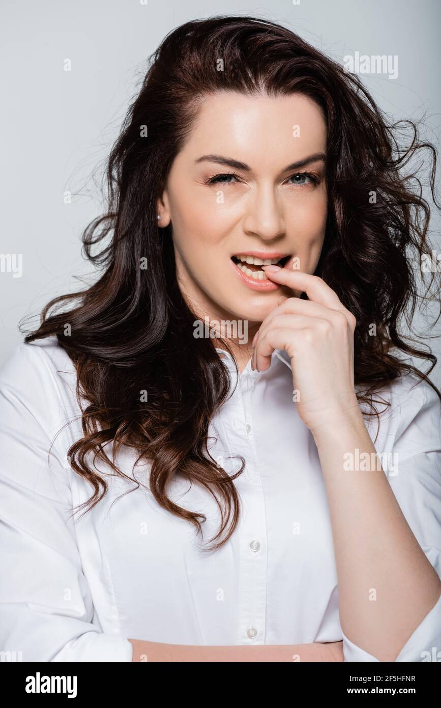 Finger at teeth hires stock photography and images Alamy