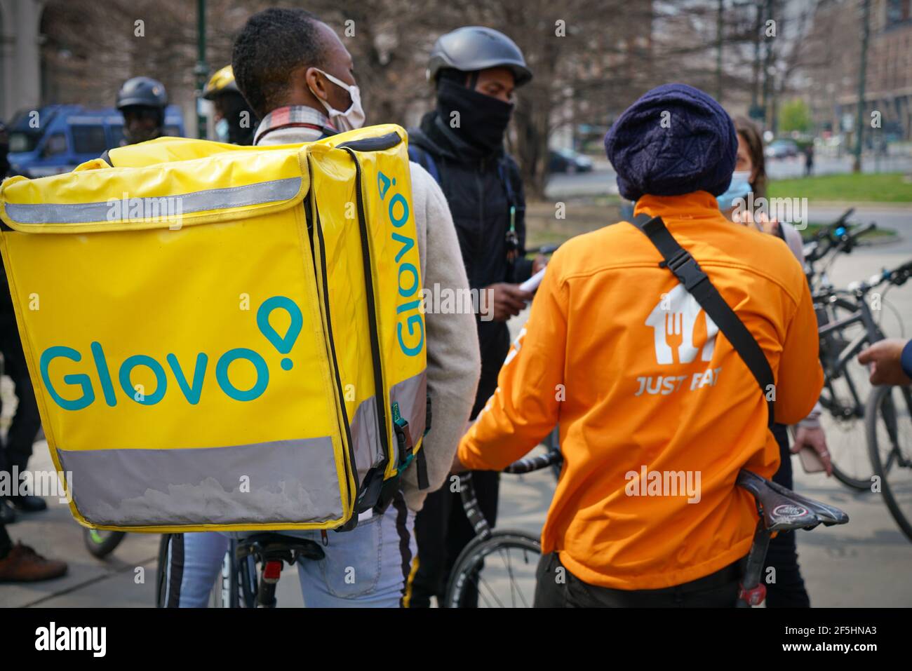 Bicycle food delivery riders protest against working conditions. Turin, Italy - March 2021 Stock Photo