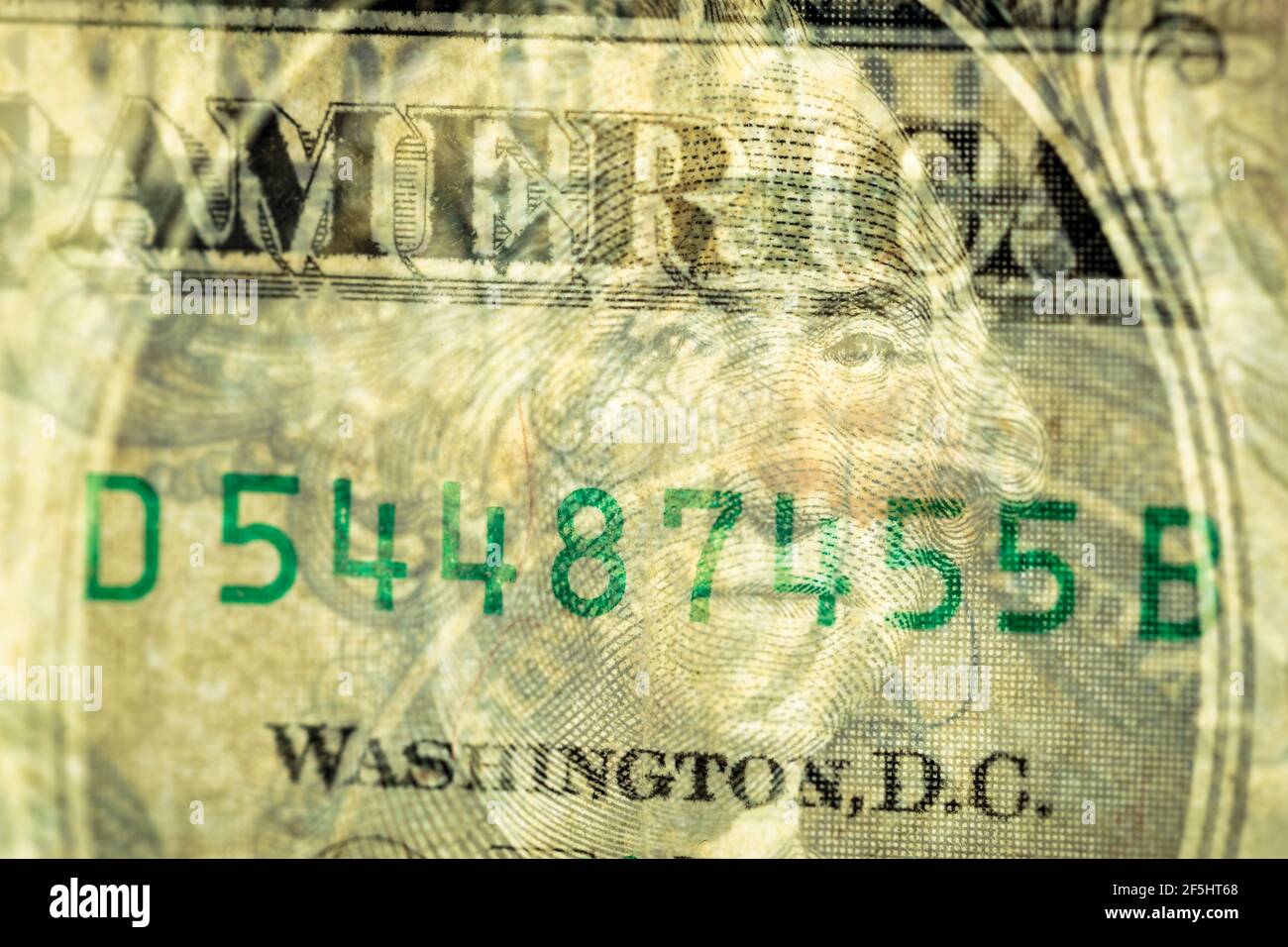 Horizontal macro double exposure of front and reverse sides one dollar bill with portrait of George Washington and the words America, Washington DC Stock Photo