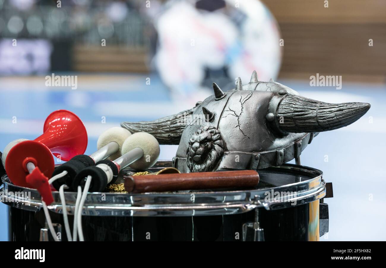 readytouse fan equipment at an indoor sports event drum, horn and