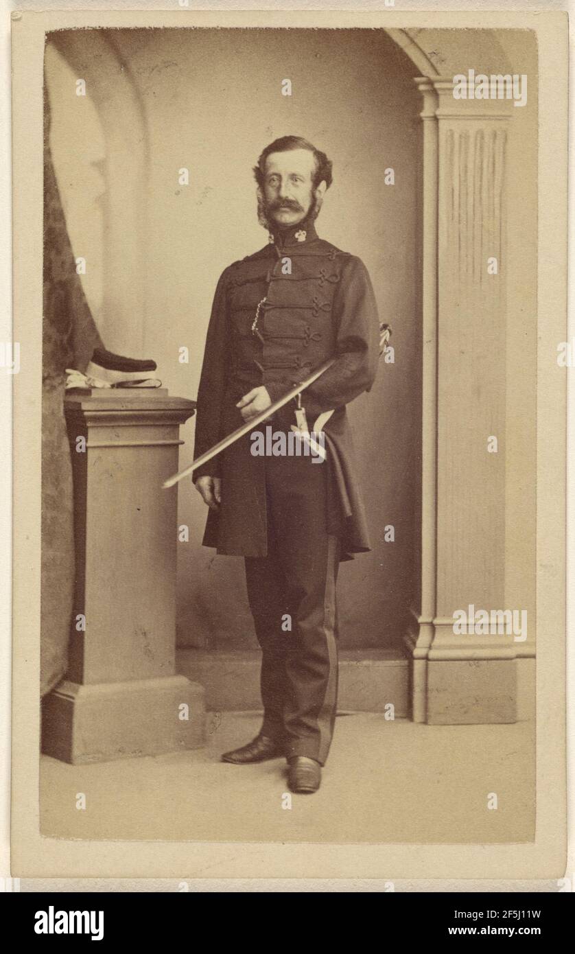 Unidentified bearded British soldier with sword under his left arm, standing. Thomas Rodger (Scottish, 1832 - 1883) Stock Photo